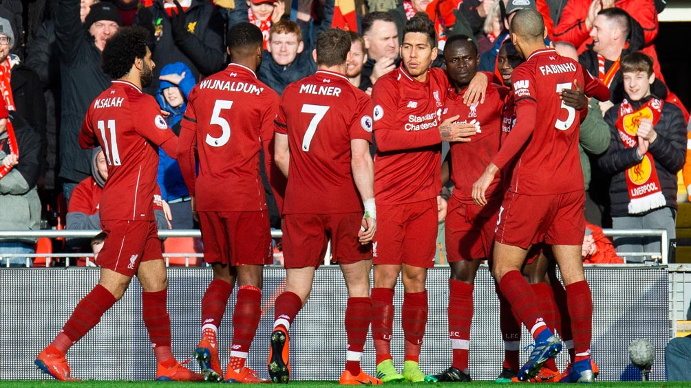 Jugadores del Liverpool celebran la victoria