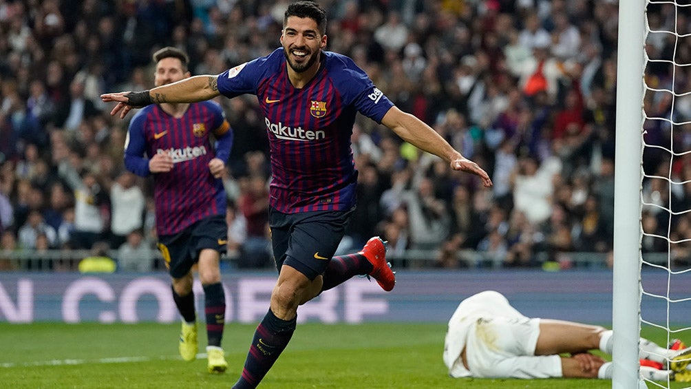 Suárez celebra uno de sus tres goles contra Real Madrid