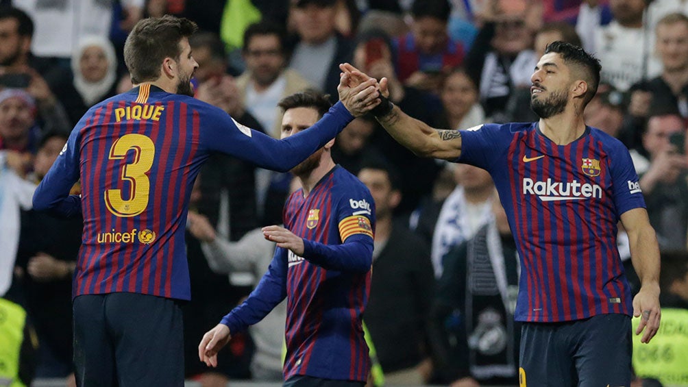 Luis Suárez festeja uno de sus goles contra Real Madrid