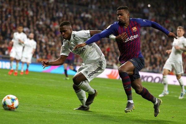 Semedo y Vinicius durante Clásico