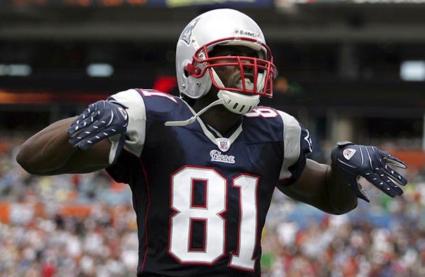 Randy Moss celebra una jugada con Patriots