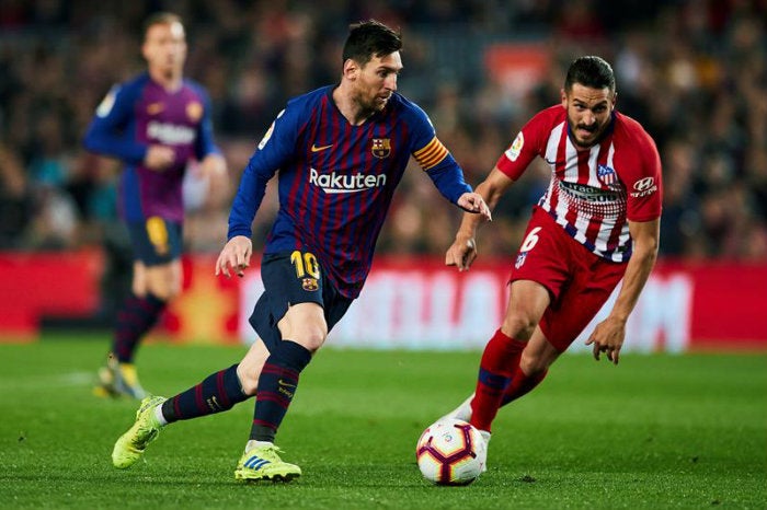 Messi y Koke durante el partido