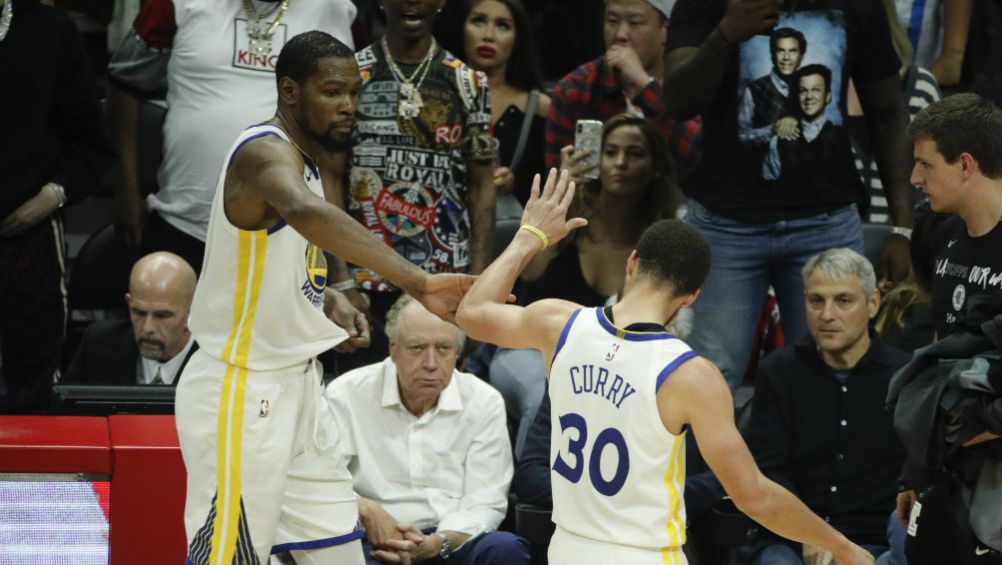 Kevin Durant y Stephen Curry, durante el partido 