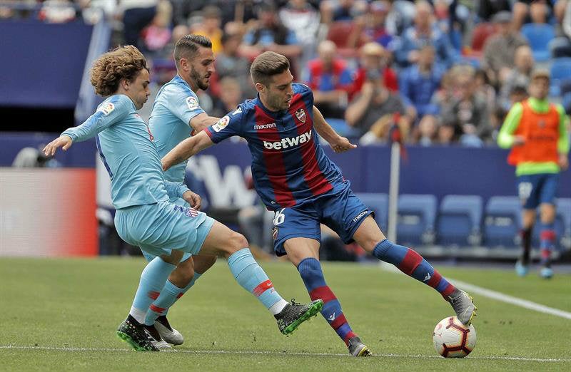 Rochina y Griezmann durante el partido