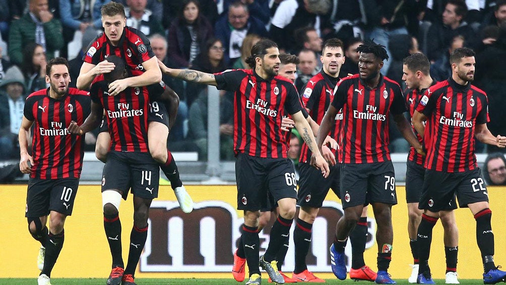 Jugadores del Milan durante un duelo en Serie A