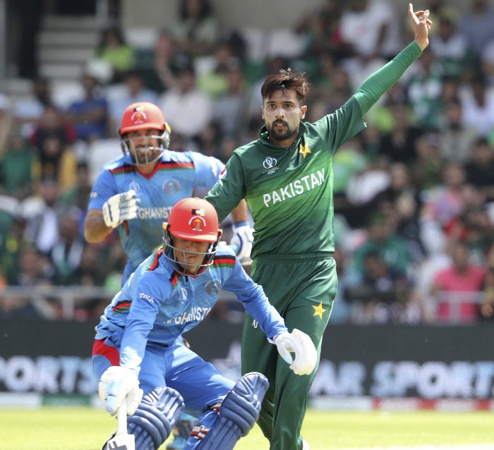 Jugadores de  Pakistán y Aganistán, durante el partido