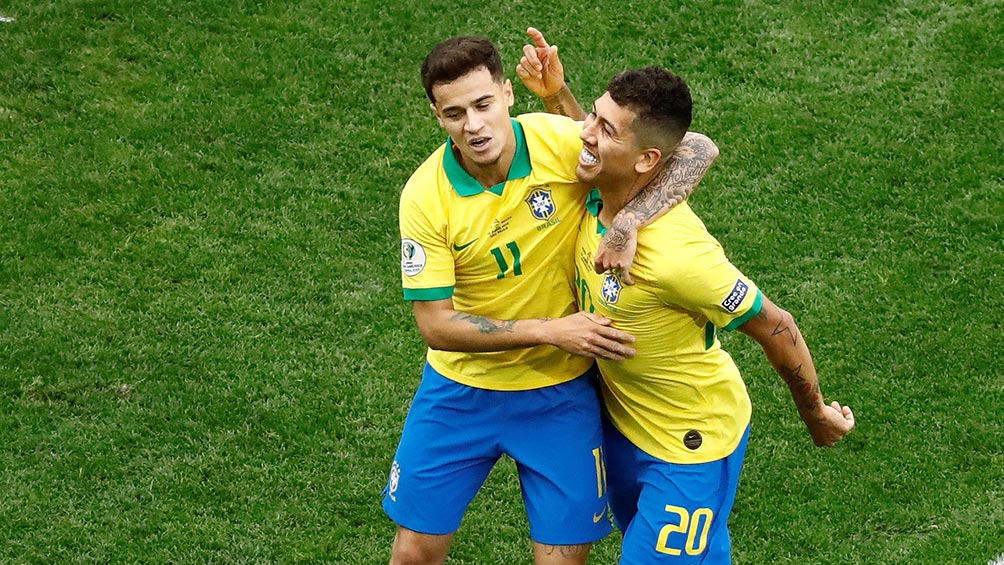 Coutinho y Firmino festejan gol de Brasil