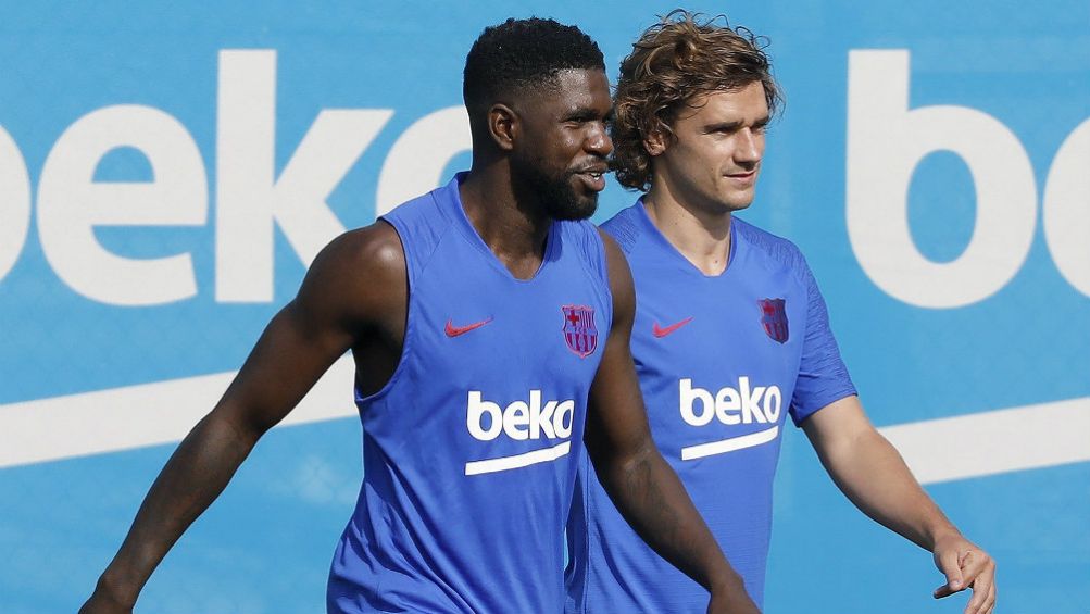 Umtiti y Griezmann en un entrenamiento con el Barcelona