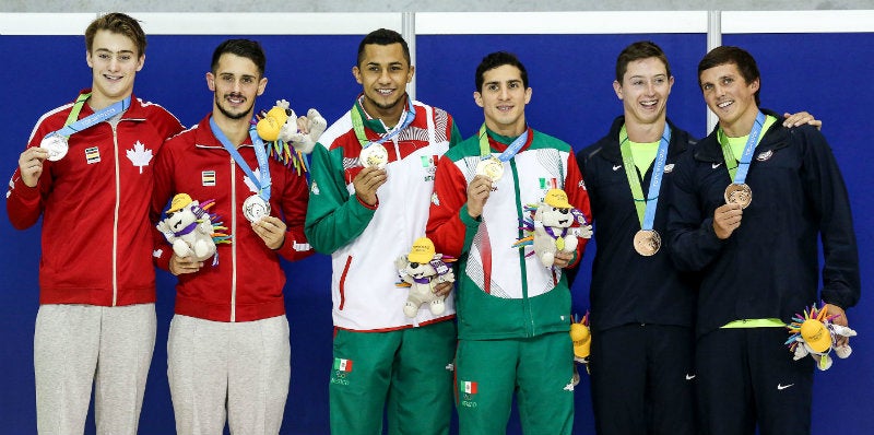 Rommel Pacheco y Jahir Ocampo con su medalla de JP 2015