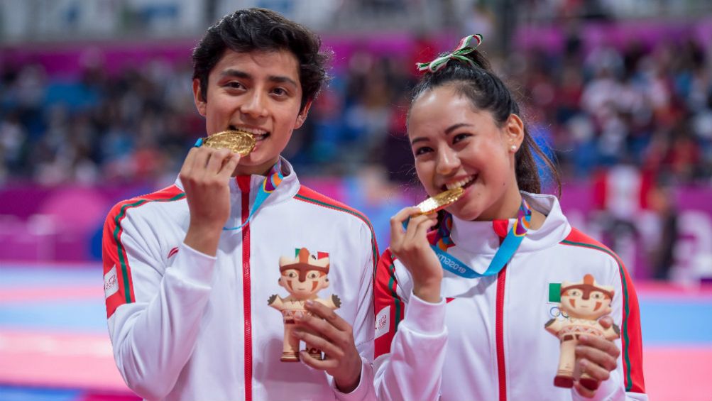 Leonardo Juárez y Zulema Ibáñez, con su medalla de Oro en Lima 2019