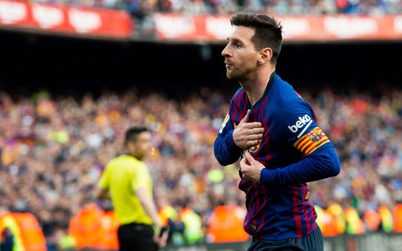 Messi celebra una anotación con el Barcelona 