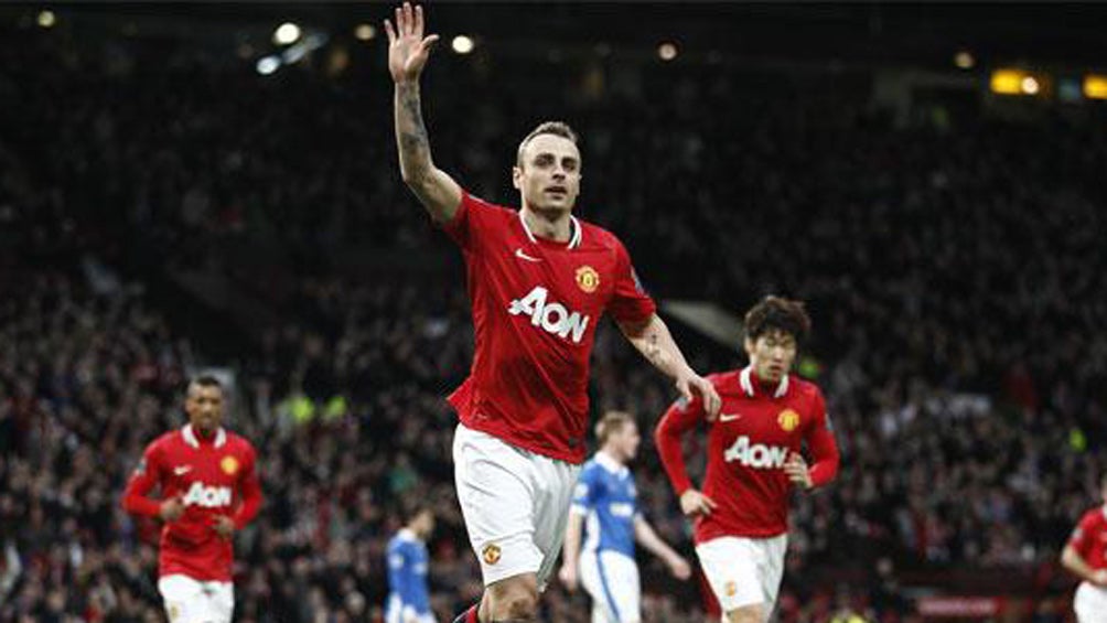 Berbatov celebra una anotación con el Manchester United 