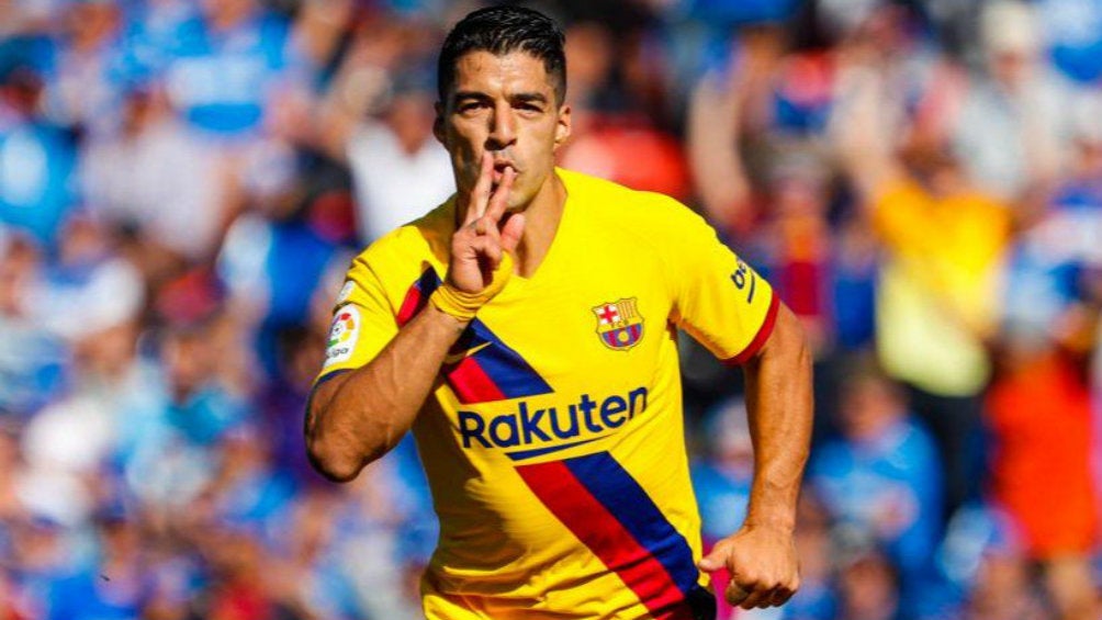 Luis Suárez celebrando una anotación con Barcelona