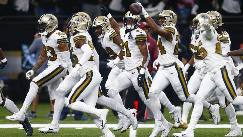 Jugadores de Saints, en festejo contra Dallas