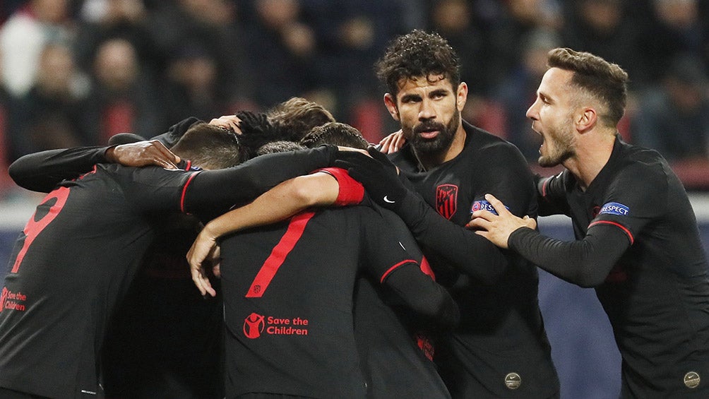 Jugadores del Altético de Madrid celebran gol contra Lokomotiv 