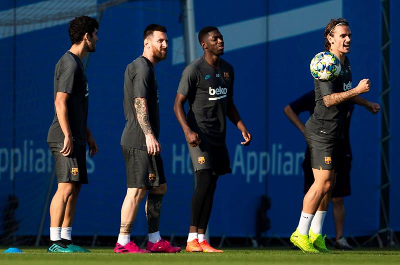 Messi y Griezmann en un entrenamiento con el Barça