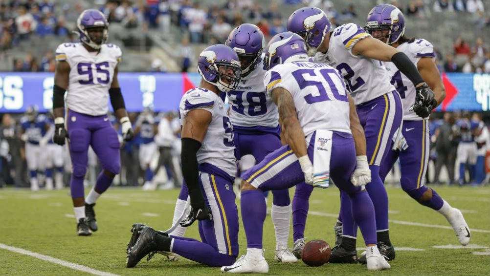 Jugadores de Vikings, en celebración de anotación