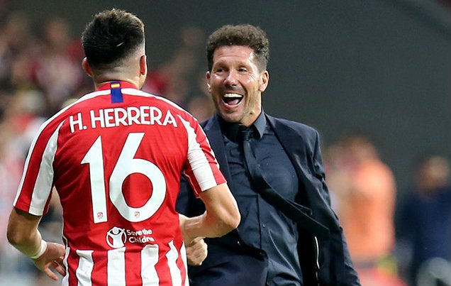 Herrera y Simeone, en un partido