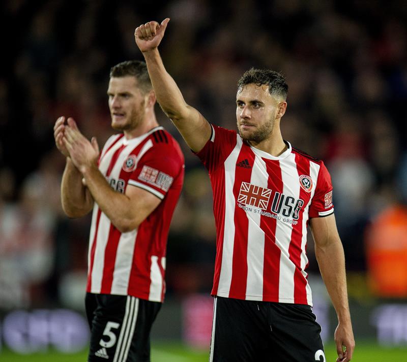 Jugadores del Sheffield festejan su triunfo ante el Arsenal 