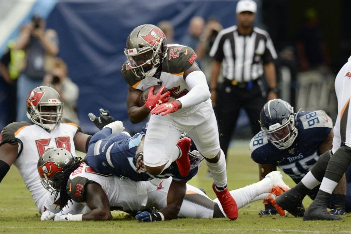 Peyton Barber, durante el partido ante Titans