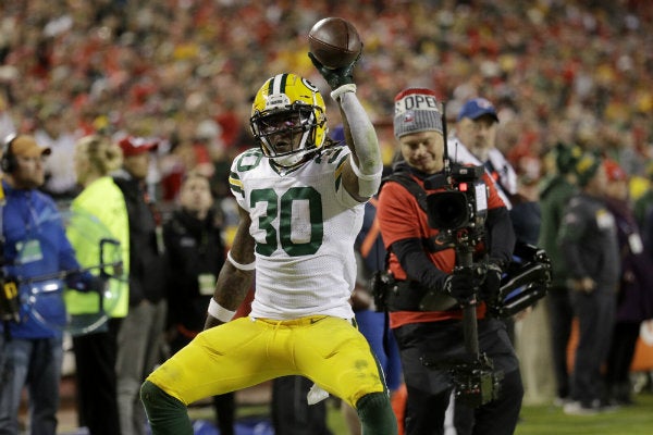 Jamaal Williams celebrando su anotación con Packers