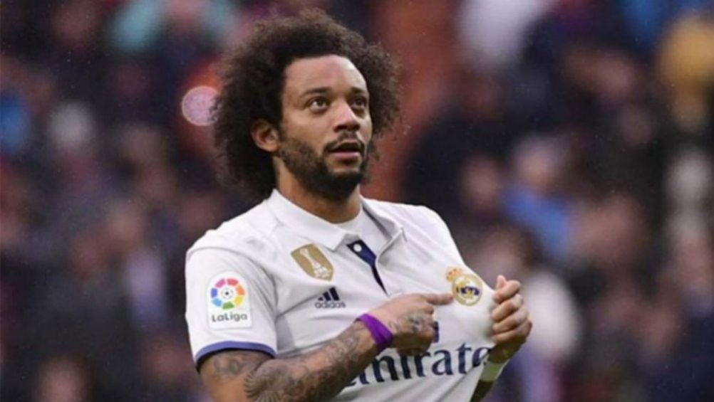 Marcelo celebrando una anotación con Real Madrid