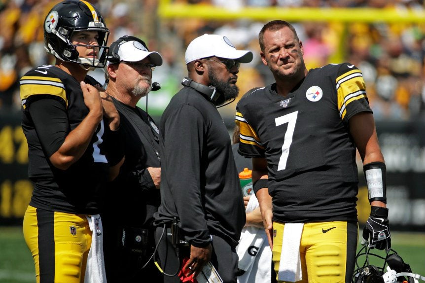 Mike Tomlin con el Big Ben en un juego de Steelers