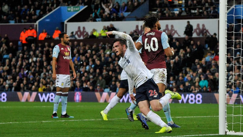 Robertson celebra su anotación contra Aston Villa 