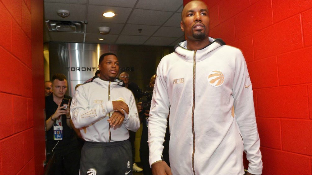 Lowry y Serge Ibaka antes de un encuentro 