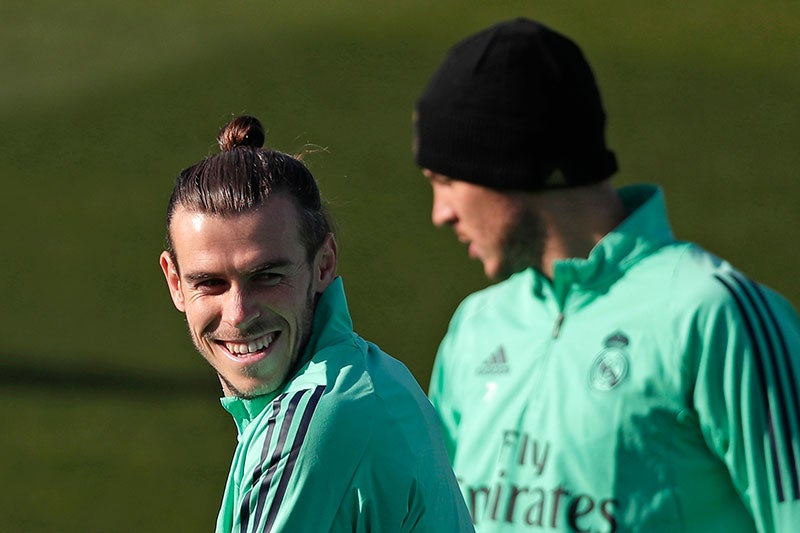 Gareth Bale se ríe durante un entrenamiento del Real Madrid