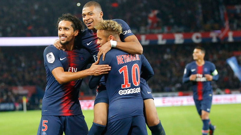 Marquinhos, Mbappé, Neymar celebran un gol del PSG 