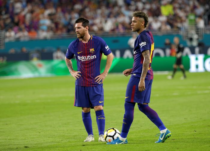 Messi y Neymar, durante un partido