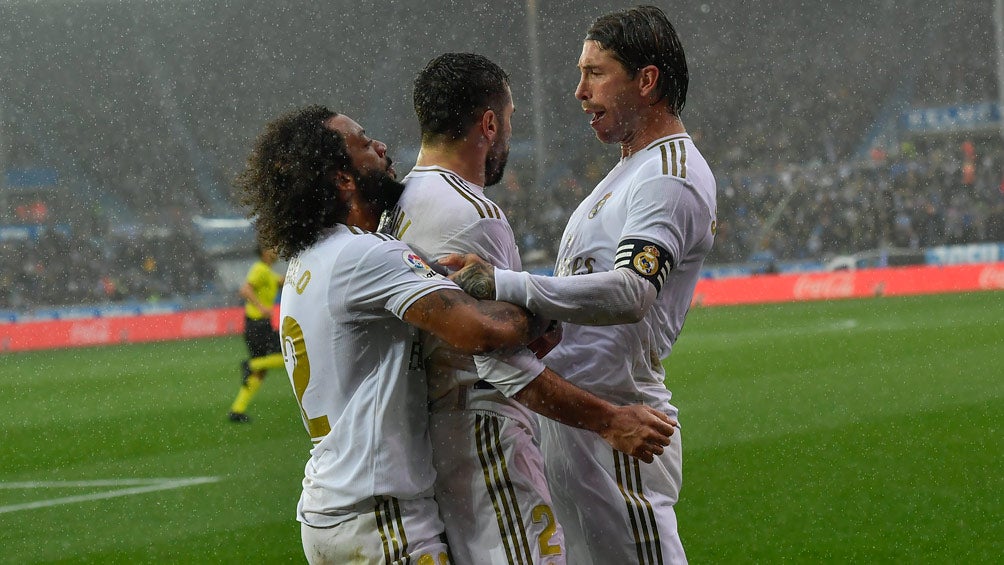 Marcelo y Ramos celebran con Carvajal su anotación 