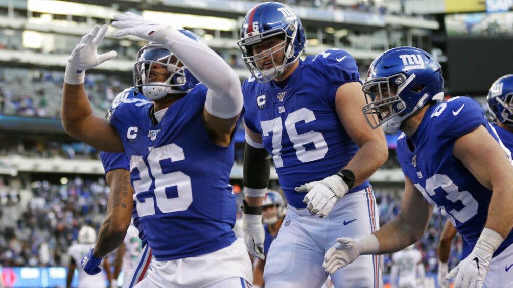 Saquon Barkley celebra una anotación contra Miami