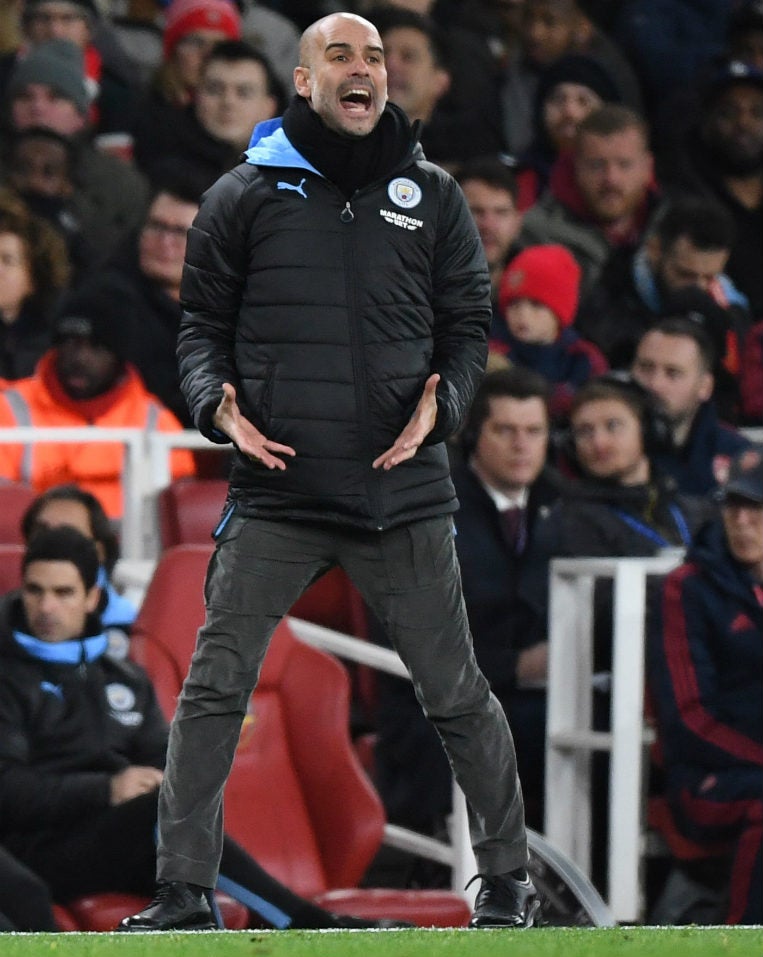 Pep Guardiola durante un partido del Manchester City