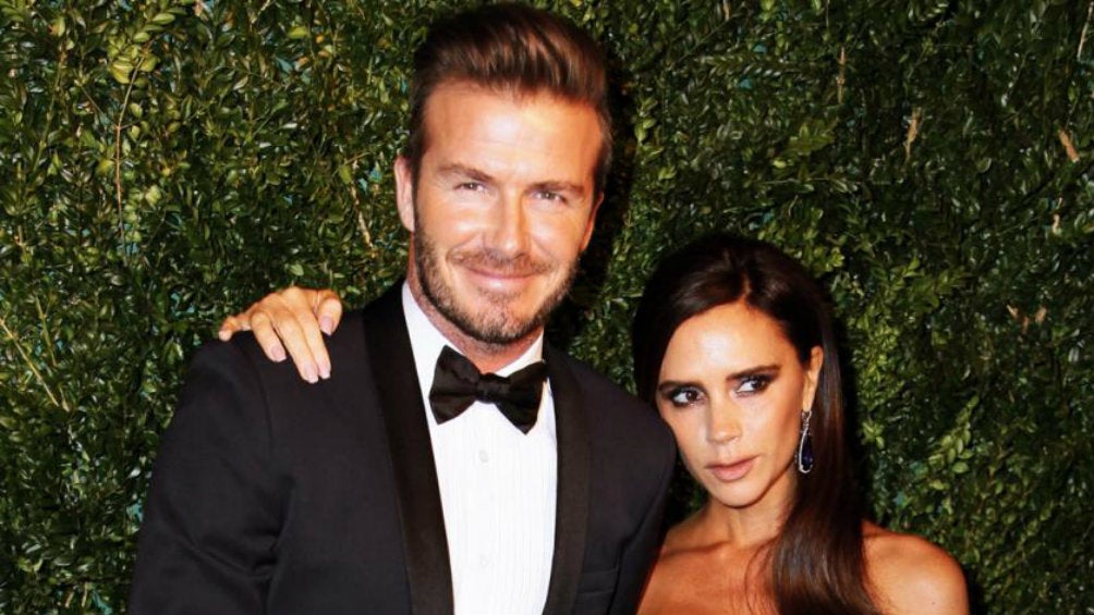 David y Victoria Beckham en una ceremonia