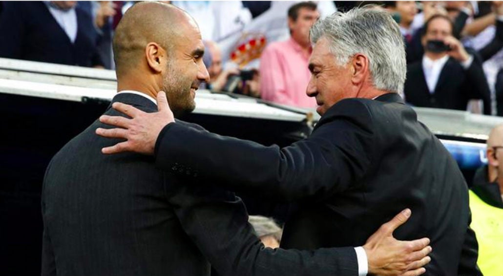 Pep y Carlo se saludan previo a un juego 