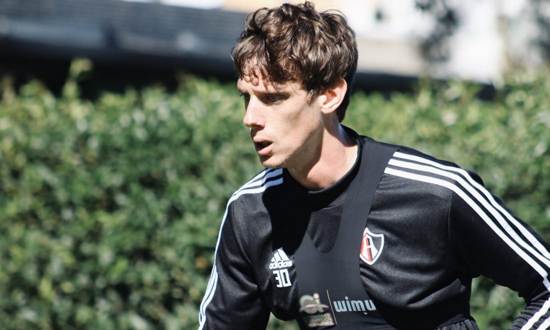 Germán Conti durante un entrenamiento con Atlas