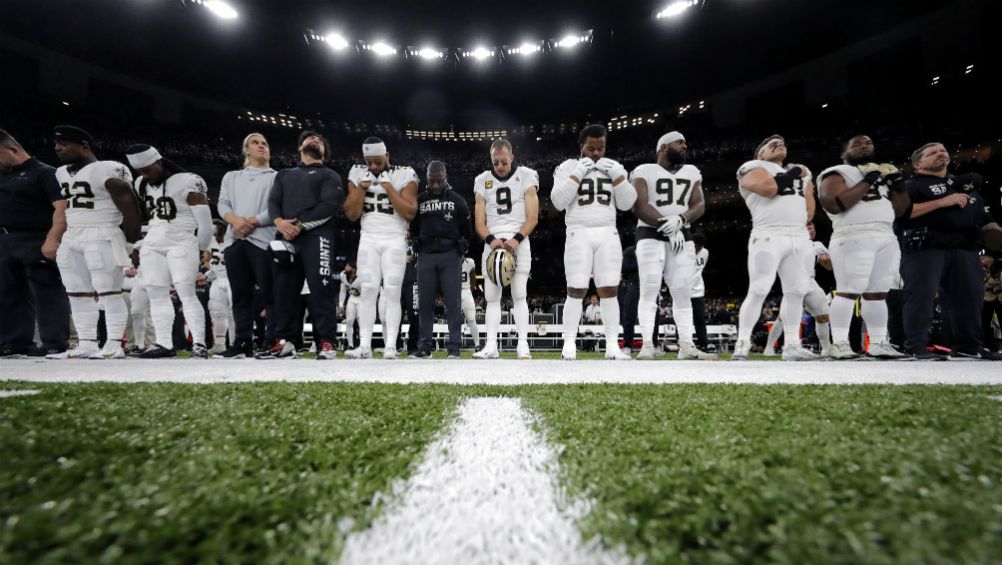 Jugadores de Saints guardan minuto de silencio