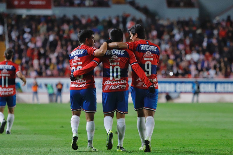 Javier López y José Juan Macías, en festejo de gol