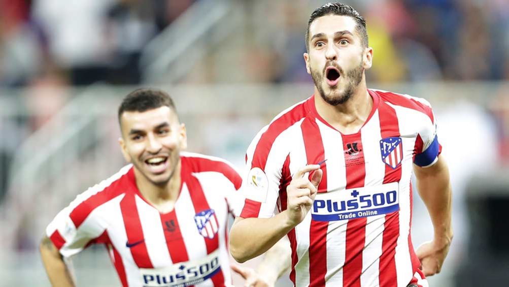 Koke en festejo de gol