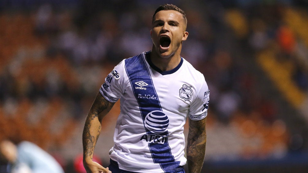 Christian Tabó celebrando un gol con Puebla