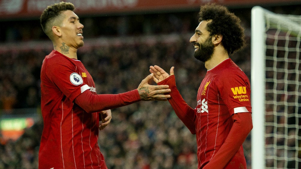 Roberto Firmino y Mohamed Salah celebrando un gol ante Southampton