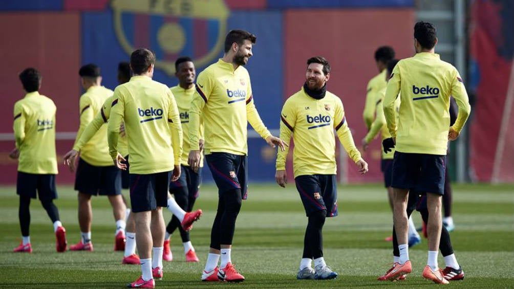 Leo Messi y Piqué en un entrenamiento 