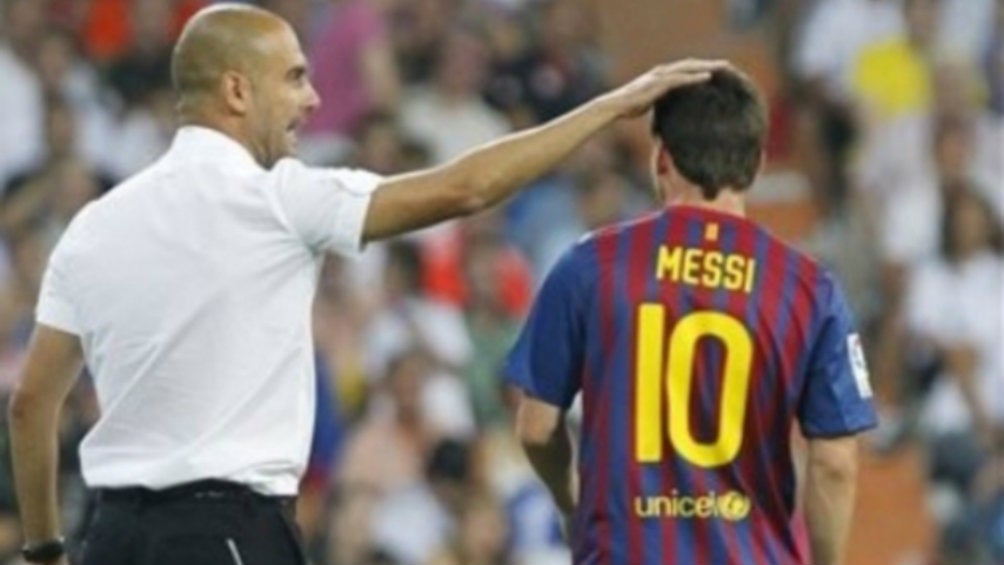 Pep Guardiola junto a Lionel Messi