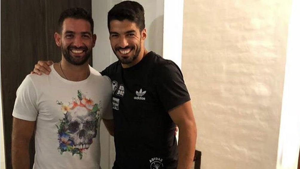 Luis Suárez y Martín Cauteruccio en una reunión 