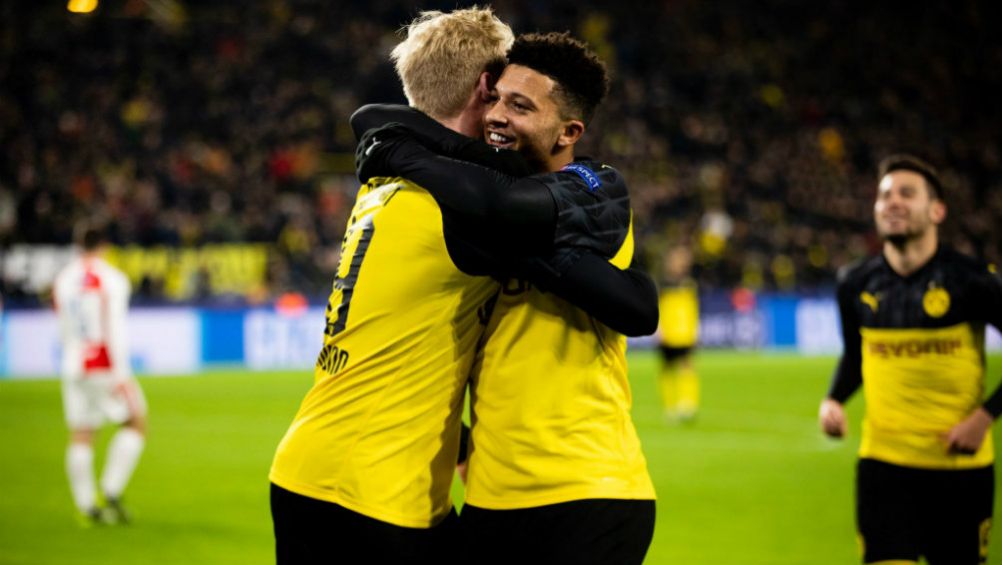 Julian Brandt y Jadon Sancho en festejo de gol