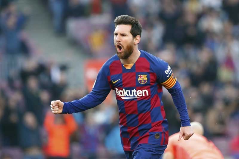 Leo Messi celebra una anotación con el Barcelona 