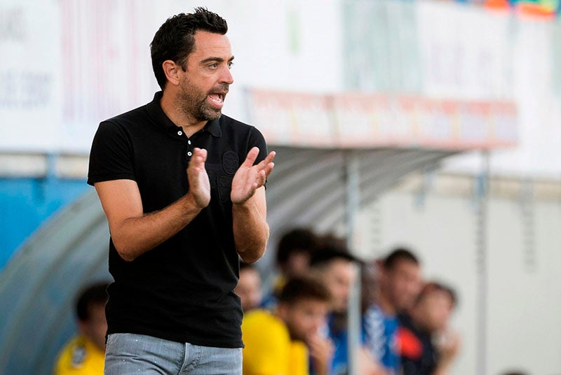 Xavi durante un duelo del Al-Sadd