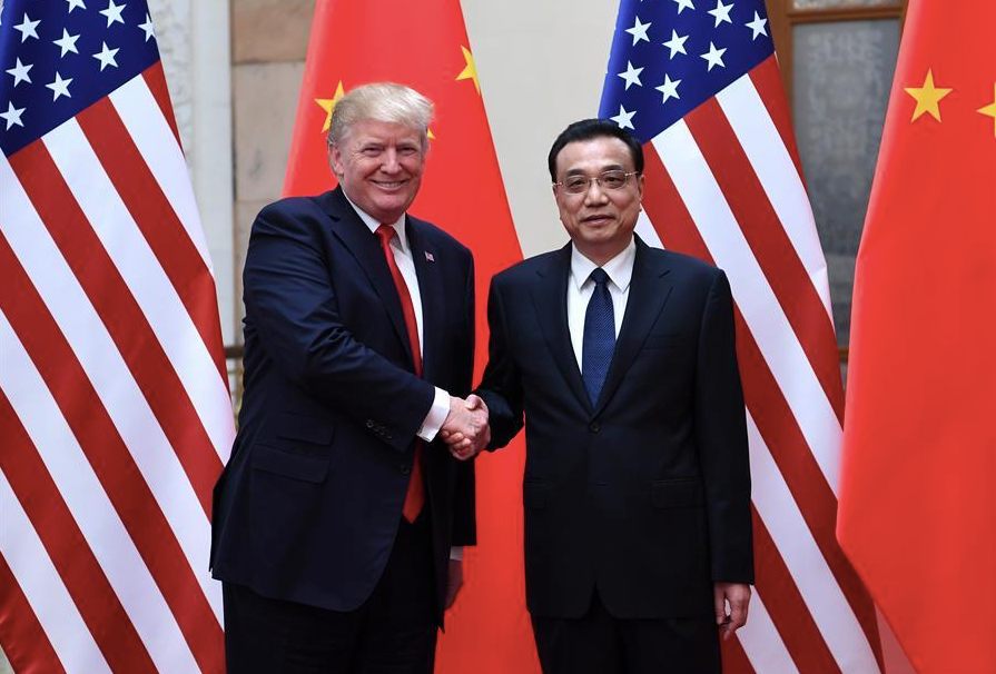 Trump y el primer ministro chino, Li Keqiang.